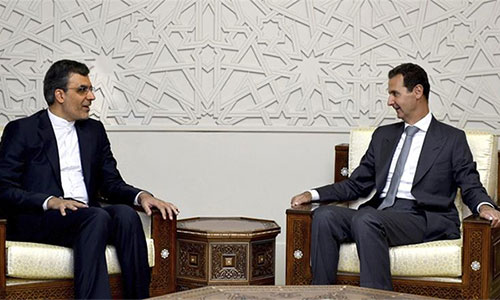 Bashar al Assad en una reunión con Husein Yaberi Ansari